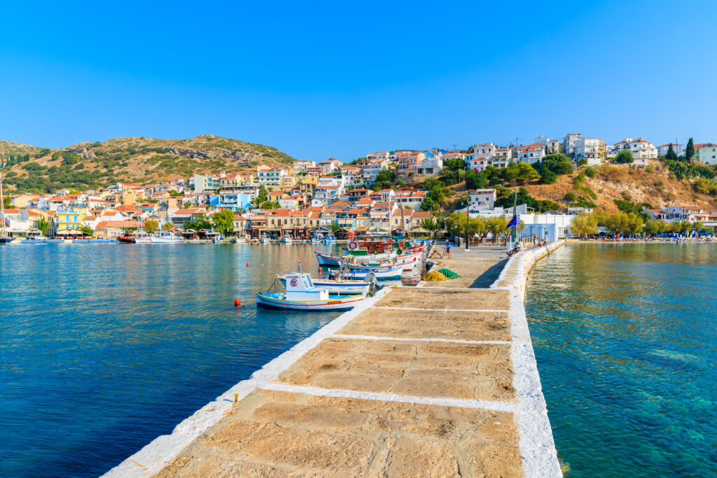 pier,in,pythagorion,port,with,fishing,boats,in,distance,,samos